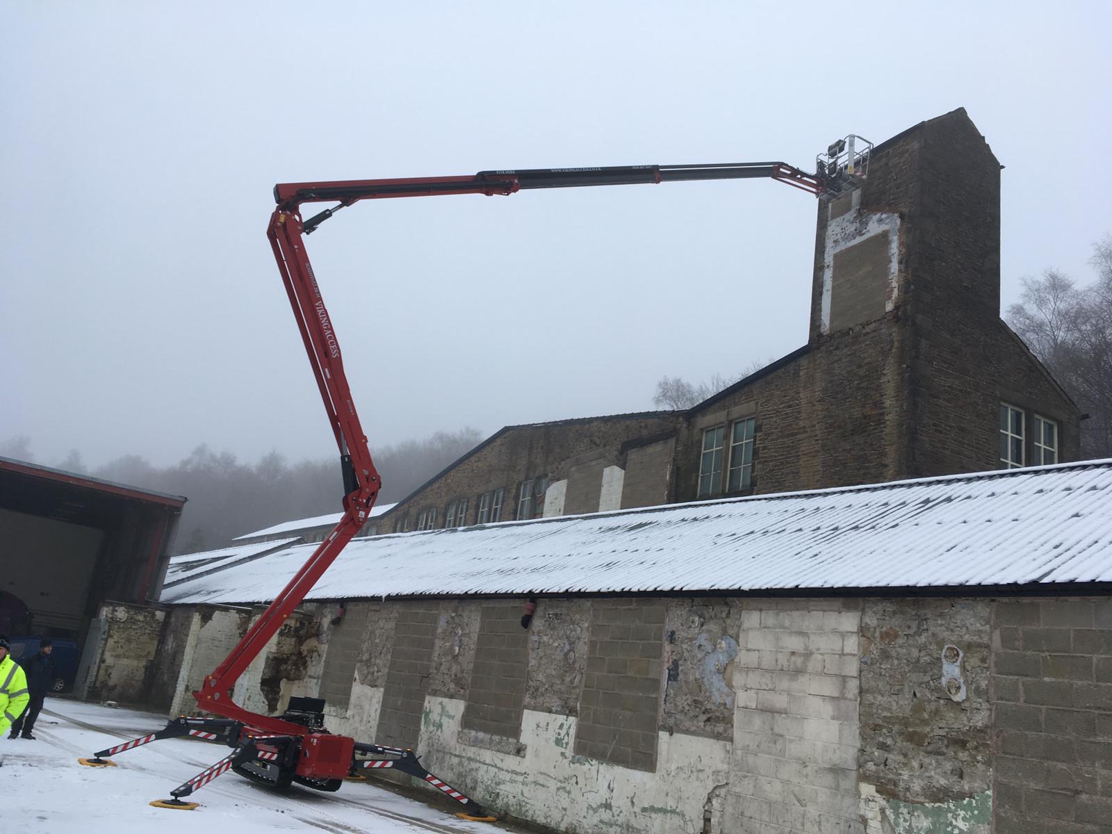 Tracked Boom Specialist Saves the Day for Property Developer