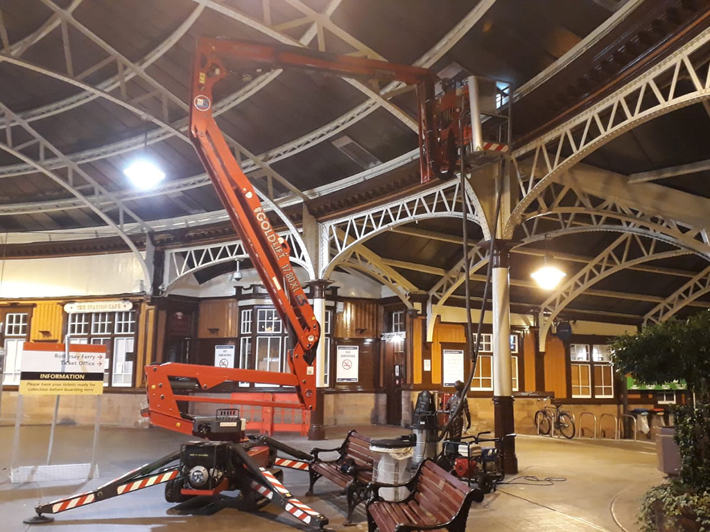 DJD Services finds its Hinowa spider platforms are ideal for reaching out over rail lines to work on overhead structures, such as roofs, power lines and lighting.