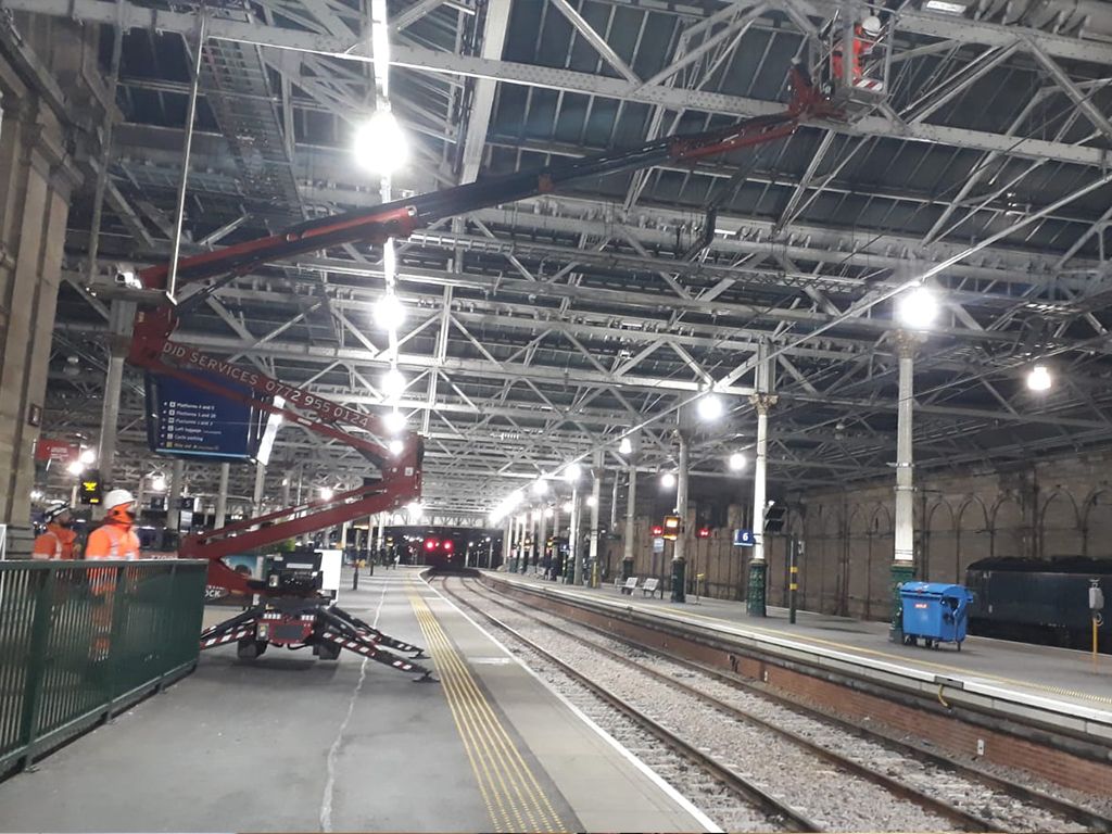 DJD Services finds its Hinowa spider platforms are ideal for reaching out over rail lines to work on overhead structures, such as roofs, power lines and lighting.